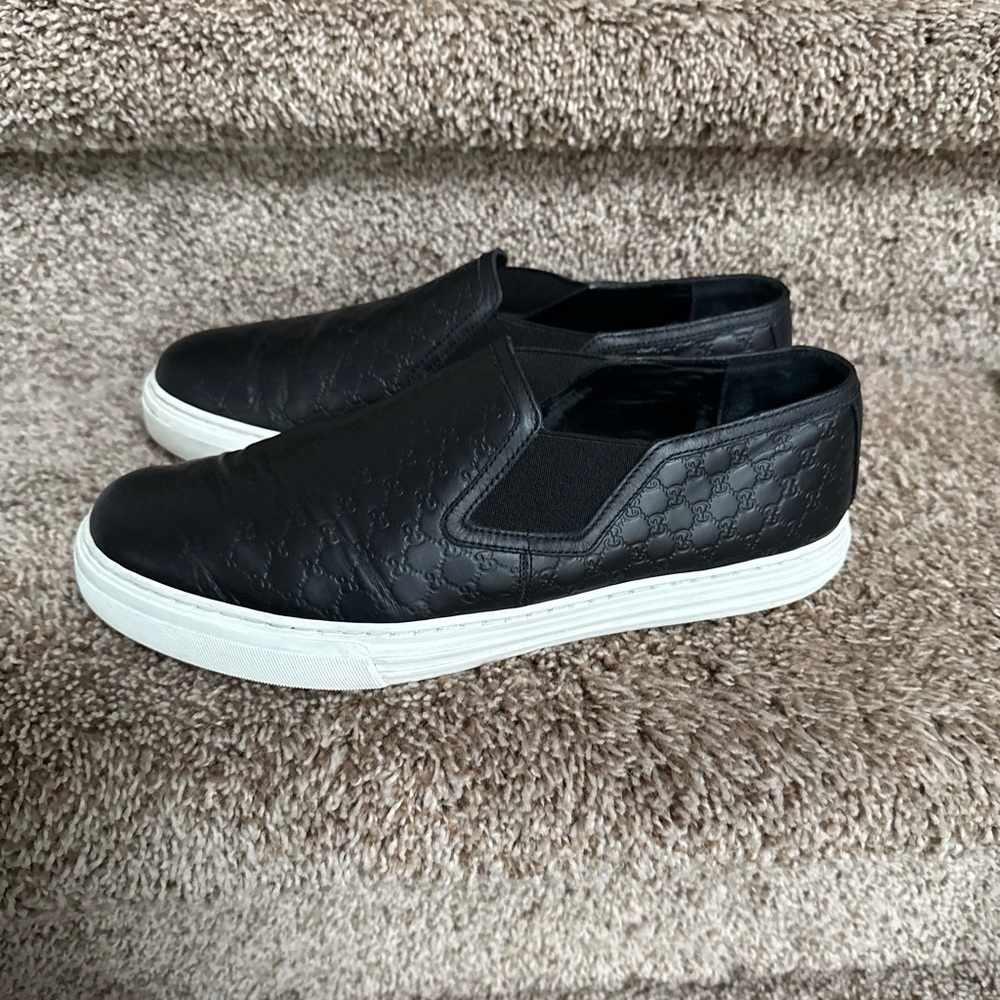 Gucci Men’s Black Slip-On Leather Sneakers with White Soles